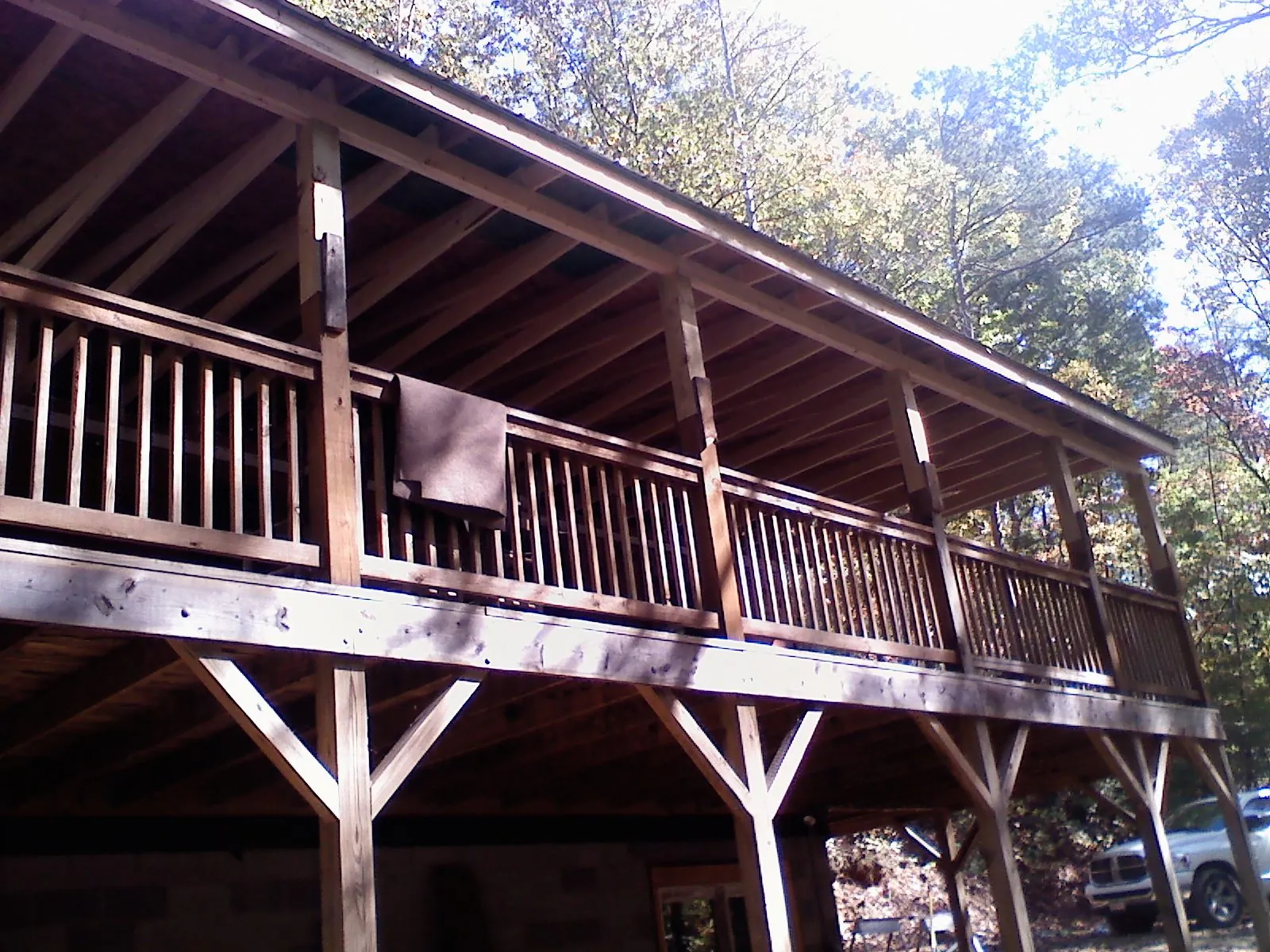Timber framing under a new elevated porch and deck — Roof Leak Repair in Serena by Roofing Brothers
